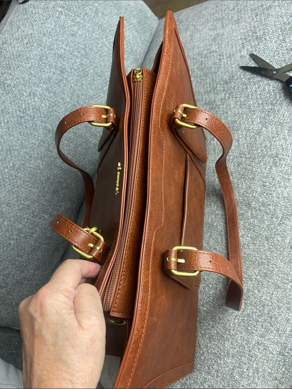 Leather-Textured Tan Tote with Tassel Accent for laptop work